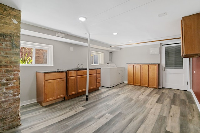 919 N Harvey Ave, Oak Park, IL 60302 - kitchen featuring washing machine and dryer, brown cabinets, light wood finished floors, and recessed lighting