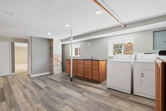 919 N Harvey Ave, Oak Park, IL 60302 - laundry area featuring washing machine and clothes dryer, recessed lighting, and light wood finished floors
