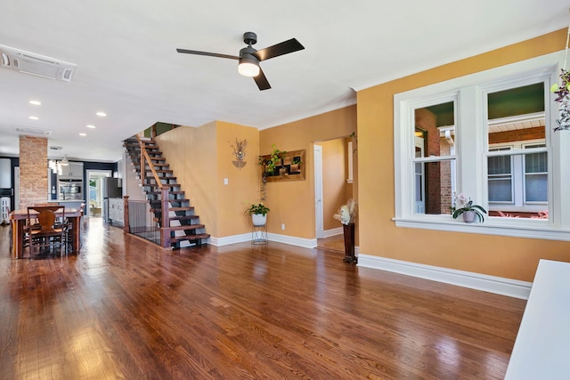 919 N Harvey Ave, Oak Park, IL 60302 - unfurnished living room featuring a ceiling fan, wood finished floors, crown molding, stairs, and recessed lighting