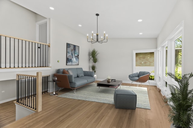 319 Kilpatrick Ave, Wilmette, IL 60091 - living room with a chandelier, wood finished floors, and recessed lighting
