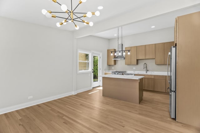 319 Kilpatrick Ave, Wilmette, IL 60091 - kitchen with a chandelier, light wood-style floors, a center island, light countertops, and recessed lighting