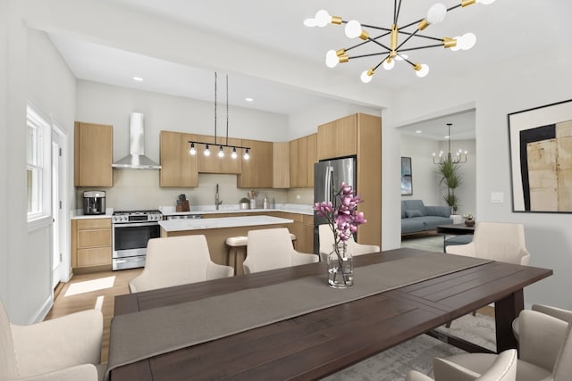 319 Kilpatrick Ave, Wilmette, IL 60091 - dining area with a chandelier, light wood-style flooring, and recessed lighting