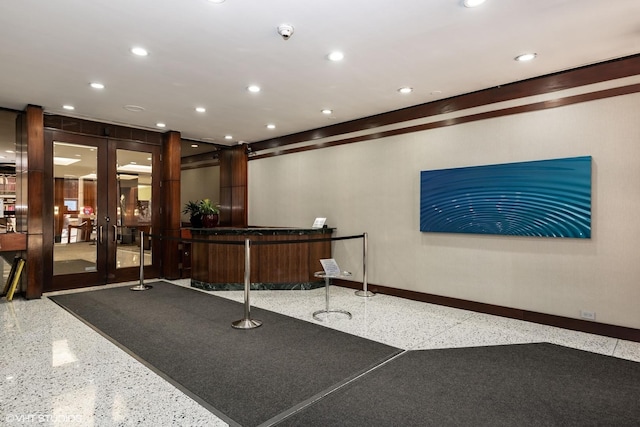 535 N Michigan Ave Unit 2203-2204, Chicago, IL 60611 - reception featuring a community bar, recessed lighting, and french doors