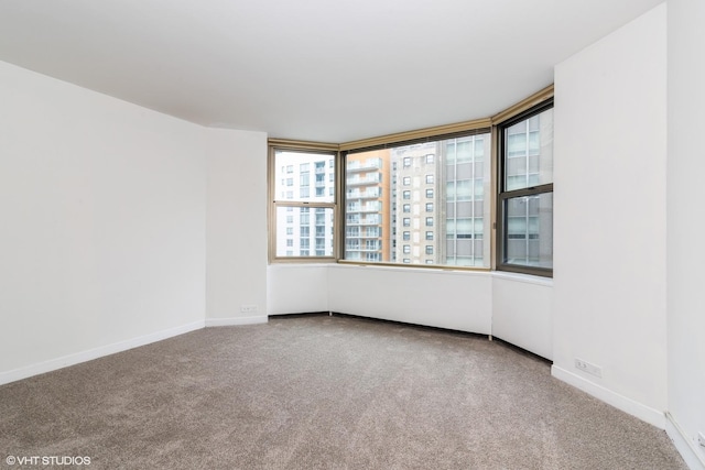535 N Michigan Ave Unit 2203-2204, Chicago, IL 60611 - empty room featuring carpet flooring and baseboards