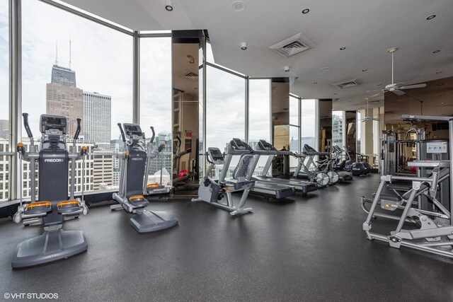 535 N Michigan Ave Unit 2203-2204, Chicago, IL 60611 - exercise room with a wall of windows, ceiling fan, and a city view