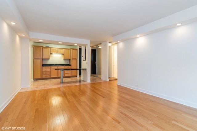 535 N Michigan Ave Unit 2203-2204, Chicago, IL 60611 - unfurnished living room with light wood-type flooring and recessed lighting