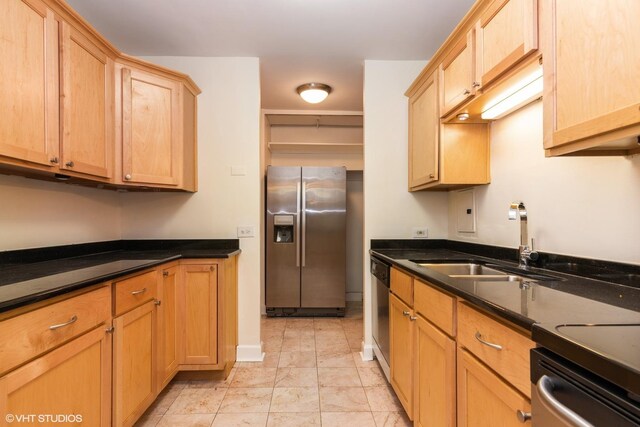 535 N Michigan Ave Unit 2203-2204, Chicago, IL 60611 - kitchen featuring appliances with stainless steel finishes, dark countertops, light marble finish flooring, and light brown cabinets