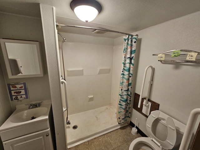2875 N Vine St, Decatur, IL 62526 - bathroom with a shower with shower curtain, vanity, tile patterned floors, and a textured ceiling