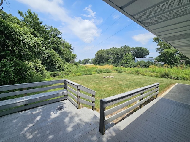 2875 N Vine St, Decatur, IL 62526 - wooden deck featuring a lawn