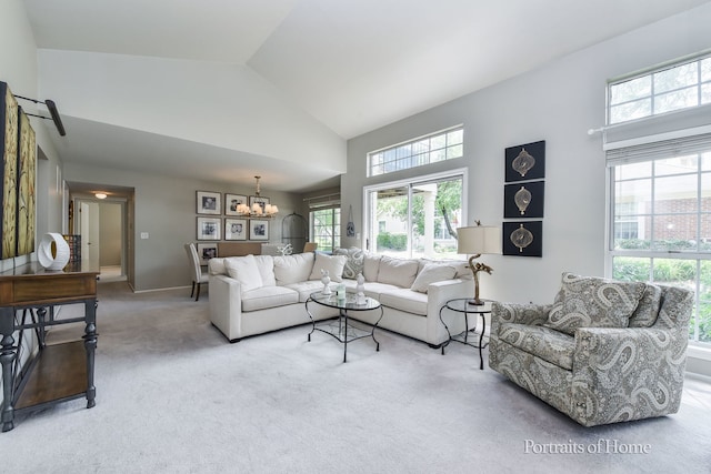 30W075 Willow Ln Unit 0, Warrenville, IL 60555 - living area with carpet floors, a chandelier, plenty of natural light, and high vaulted ceiling