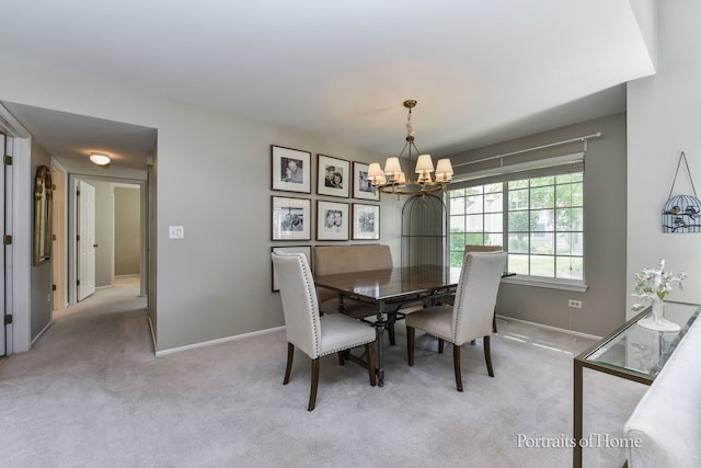 30W075 Willow Ln Unit 0, Warrenville, IL 60555 - carpeted dining space featuring a chandelier and baseboards