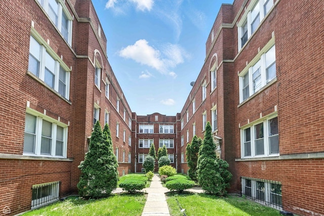 1301 E 71st Pl Unit 2S, Chicago, IL 60619 - view of apartment building / complex