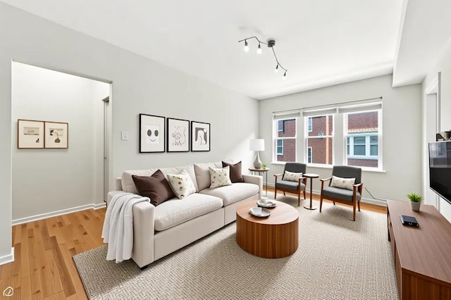 1301 E 71st Pl Unit 2S, Chicago, IL 60619 - living room featuring light wood finished floors