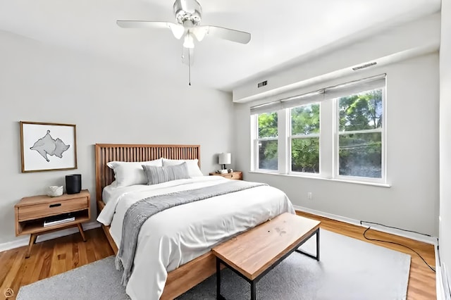 1301 E 71st Pl Unit 2S, Chicago, IL 60619 - bedroom with wood finished floors and a ceiling fan