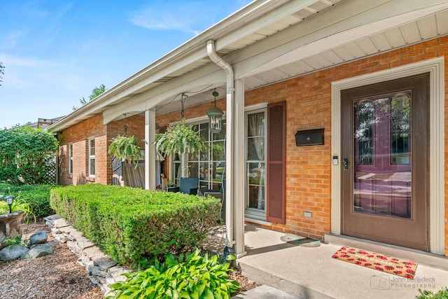 330 N Country Club Dr, Addison, IL 60101 - entrance to property featuring brick siding and a porch