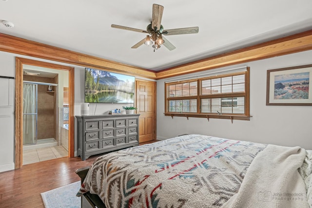 330 N Country Club Dr, Addison, IL 60101 - bedroom with wood finished floors, ensuite bathroom, and ceiling fan