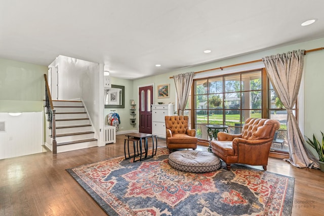 330 N Country Club Dr, Addison, IL 60101 - living room with wood finished floors, radiator, stairway, and recessed lighting