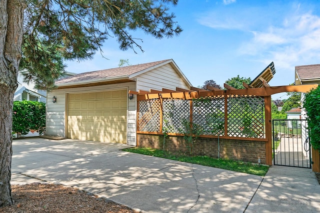 330 N Country Club Dr, Addison, IL 60101 - garage featuring driveway and a gate
