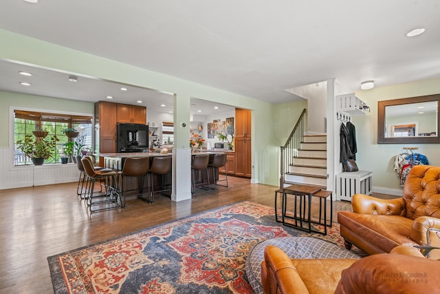330 N Country Club Dr, Addison, IL 60101 - living room with wood finished floors, stairs, and recessed lighting