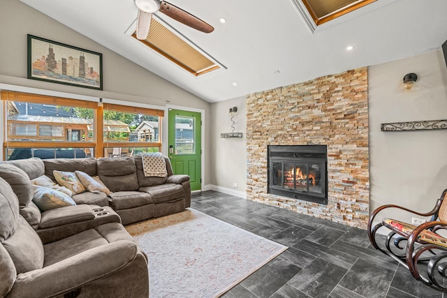 330 N Country Club Dr, Addison, IL 60101 - living room with a ceiling fan, vaulted ceiling, recessed lighting, and a stone fireplace