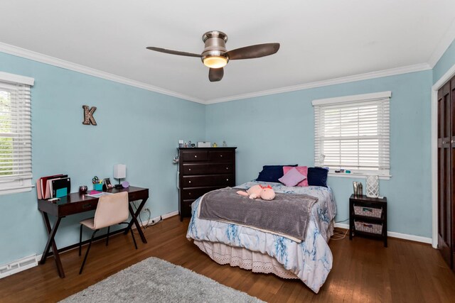 1101 Juniper Ter, Glenview, IL 60025 - bedroom with crown molding, wood finished floors, an office area, ceiling fan, and a baseboard heating unit