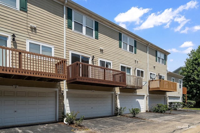 2426 Courtyard Cir Unit 3, Aurora, IL 60506 - back of property with a garage and driveway