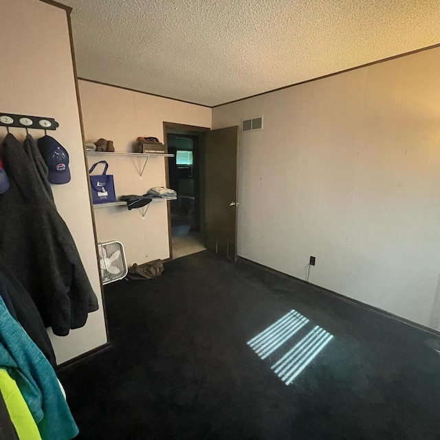 112 Crestview Dr, Hamilton, IL 62341 - empty room with a textured ceiling and carpet