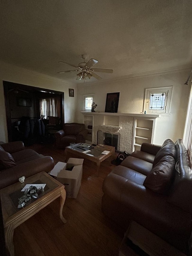 8427 S Peoria St, Chicago, IL 60620 - living room featuring wood finished floors, ceiling fan, plenty of natural light, crown molding, and a fireplace