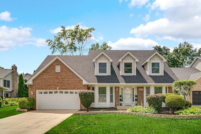 1630 Ainsley Ln, Lombard, IL 60148 - cape cod-style house featuring brick siding, a front lawn, a shingled roof, and driveway