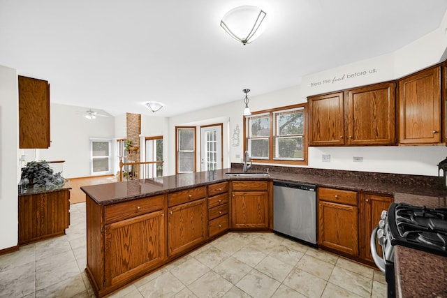 1630 Ainsley Ln, Lombard, IL 60148 - kitchen with appliances with stainless steel finishes, a peninsula, brown cabinets, and dark stone counters