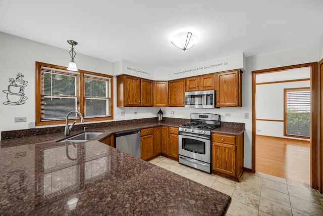 1630 Ainsley Ln, Lombard, IL 60148 - kitchen with appliances with stainless steel finishes, plenty of natural light, and brown cabinets