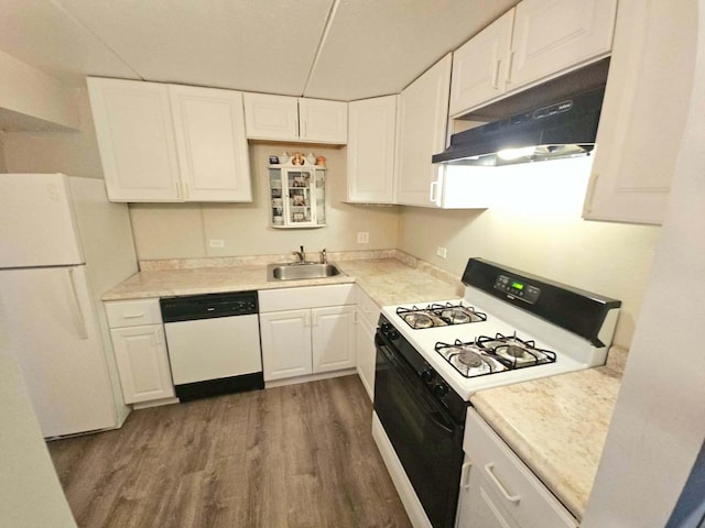 855 Village Quarter Rd Unit C, West Dundee, IL 60118 - kitchen with white appliances, wood finished floors, under cabinet range hood, white cabinetry, and light countertops