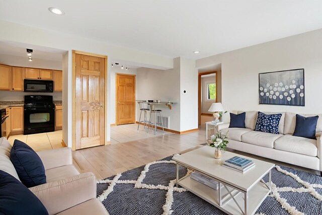 4825 W 109th St Unit 303, Oak Lawn, IL 60453 - living area with light wood-type flooring and recessed lighting