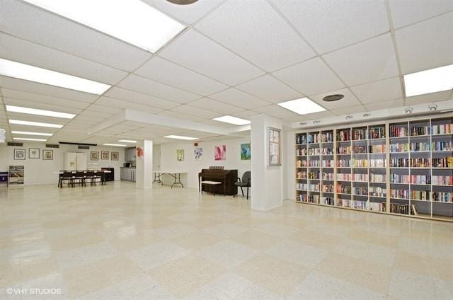 7033 N Kedzie Ave Unit 512, Chicago, IL 60645 - misc room featuring a paneled ceiling and tile patterned floors