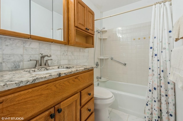 7033 N Kedzie Ave Unit 512, Chicago, IL 60645 - bathroom with vanity, shower / tub combo with curtain, and tasteful backsplash