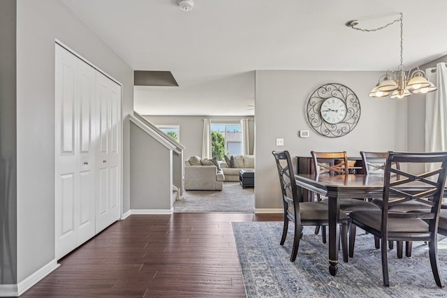 707 Brighton Dr, Pingree Grove, IL 60140 - dining room with a chandelier, wood finished floors, and stairs