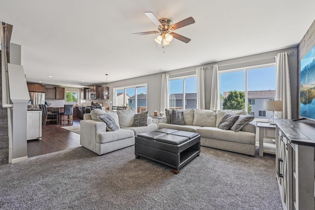 707 Brighton Dr, Pingree Grove, IL 60140 - living area with ceiling fan, dark colored carpet, and recessed lighting