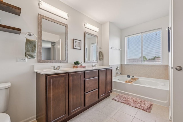 707 Brighton Dr, Pingree Grove, IL 60140 - full bathroom featuring a bath, tile patterned flooring, and double vanity