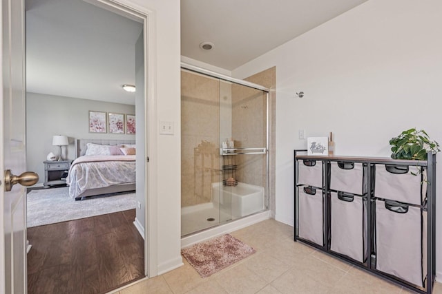 707 Brighton Dr, Pingree Grove, IL 60140 - ensuite bathroom with a stall shower and tile patterned flooring