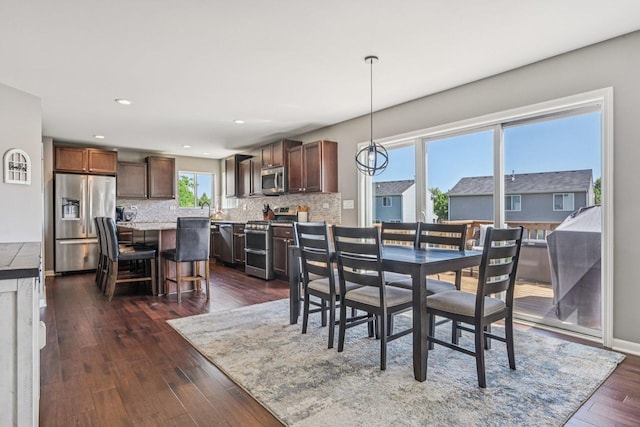 707 Brighton Dr, Pingree Grove, IL 60140 - dining space with dark wood-type flooring and recessed lighting