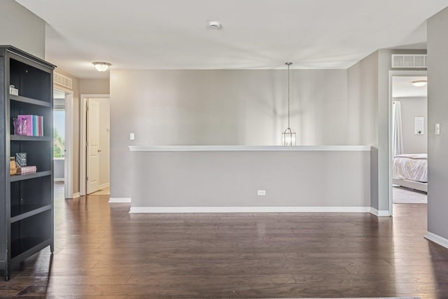 707 Brighton Dr, Pingree Grove, IL 60140 - spare room with wood-type flooring and a smoke detector