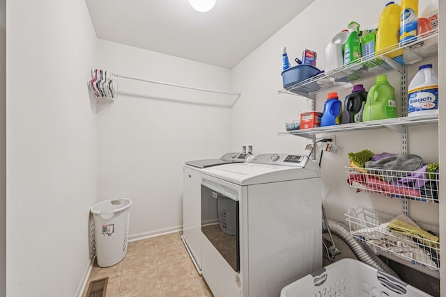 707 Brighton Dr, Pingree Grove, IL 60140 - laundry room featuring separate washer and dryer and light tile patterned floors