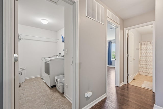 707 Brighton Dr, Pingree Grove, IL 60140 - laundry area featuring washing machine and dryer and baseboards
