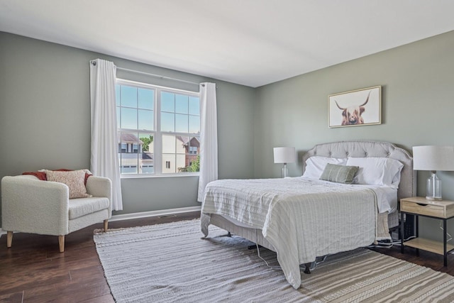 707 Brighton Dr, Pingree Grove, IL 60140 - bedroom with dark wood-style floors and baseboards