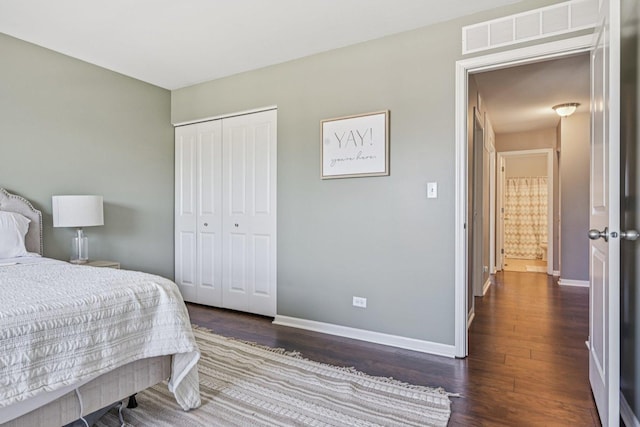 707 Brighton Dr, Pingree Grove, IL 60140 - bedroom featuring dark wood-type flooring and a closet