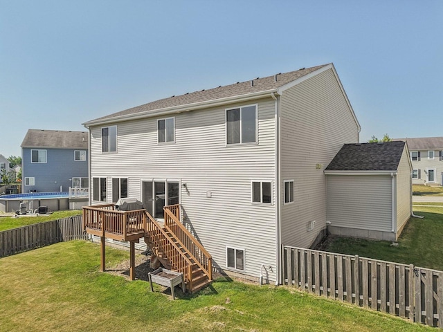 707 Brighton Dr, Pingree Grove, IL 60140 - rear view of property featuring a deck, a fenced backyard, and stairway