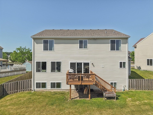 707 Brighton Dr, Pingree Grove, IL 60140 - rear view of house featuring a wooden deck and a fenced backyard