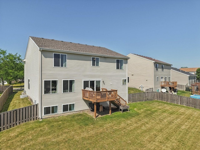 707 Brighton Dr, Pingree Grove, IL 60140 - back of property with a deck, a fenced backyard, and stairs