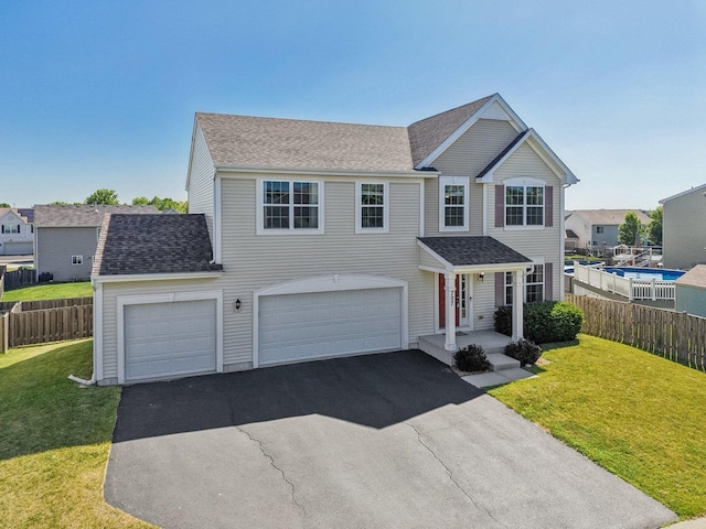 707 Brighton Dr, Pingree Grove, IL 60140 - view of front of house with asphalt driveway, a garage, and a shingled roof