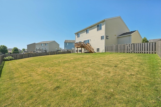 707 Brighton Dr, Pingree Grove, IL 60140 - fenced backyard featuring stairway and a wooden deck